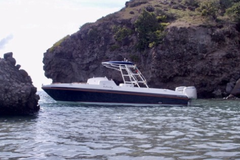 a small boat in a large body of water